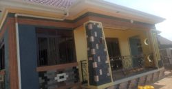 Newly built residential house with a private mailo land title in Nkoowe at 250 million