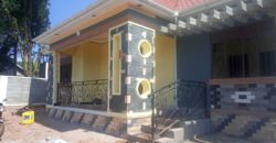 Newly built residential house with a private mailo land title in Nkoowe at 250 million