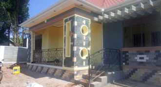 Newly built residential house with a private mailo land title in Nkoowe at 250 million