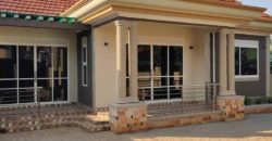 RESIDENTIAL 4 BEDROOM BANGOLOW FOR SALE IN KITENDE ON ENTEBBE ROAD AT 490M WITH A PRIVATE MAILO LAND TITLE