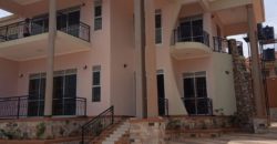 NICE 6 BEDROOM HOUSE FOR SALE IN BWEBAJJA ON ENTEBBE ROAD AT 2 BILLION , READY LAND TITLE