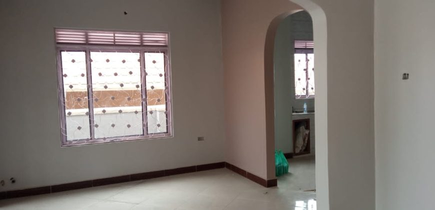 NEWLY CONSTRUCTED HOUSE FOR SALE IN BWEBAJJA SEATED ON 12 DECIMALS WITH 2 BOYS QUARTERS AT 450M