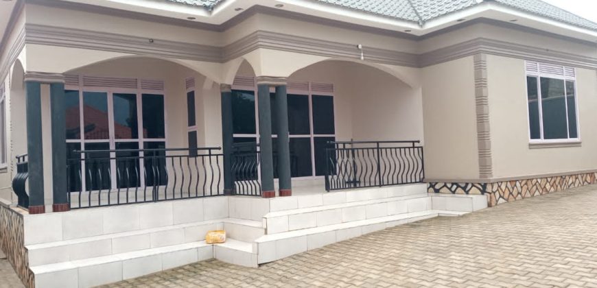 NEWLY CONSTRUCTED HOUSE FOR SALE IN BWEBAJJA SEATED ON 12 DECIMALS WITH 2 BOYS QUARTERS AT 450M